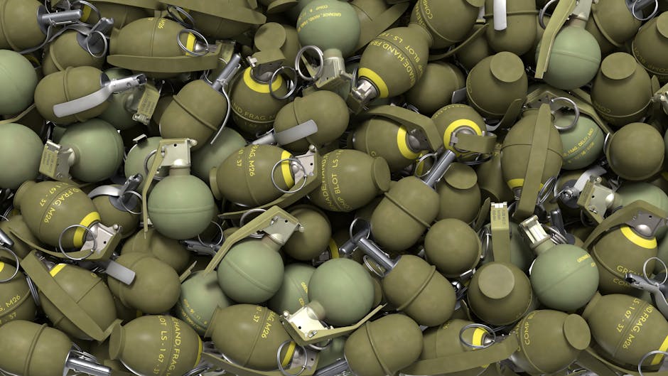 High-resolution image of olive green military hand grenades in a pile, showcasing industrial design.